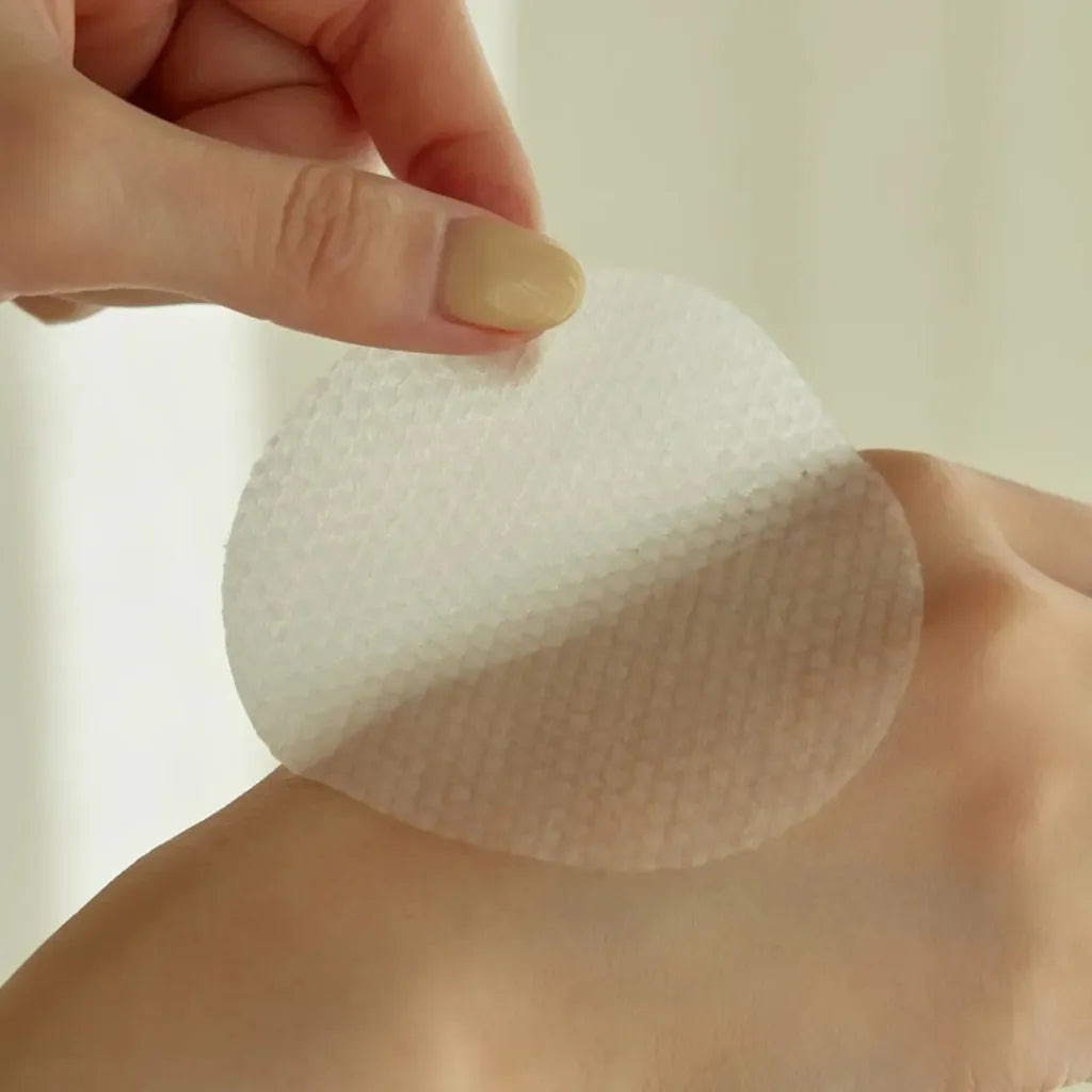 Goodal Green Tangerine Vita-C Dark Spot Care Pad 70pads - Toner pads exfoliants doux et éclaircissants à la vitamine C - texture - K-beauty soin cosmétique corée Skinorea shop France livraison rapide - yesstyle